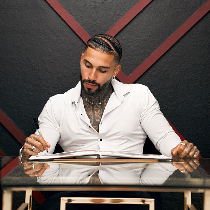 Lulu signing a limited-edition calendar