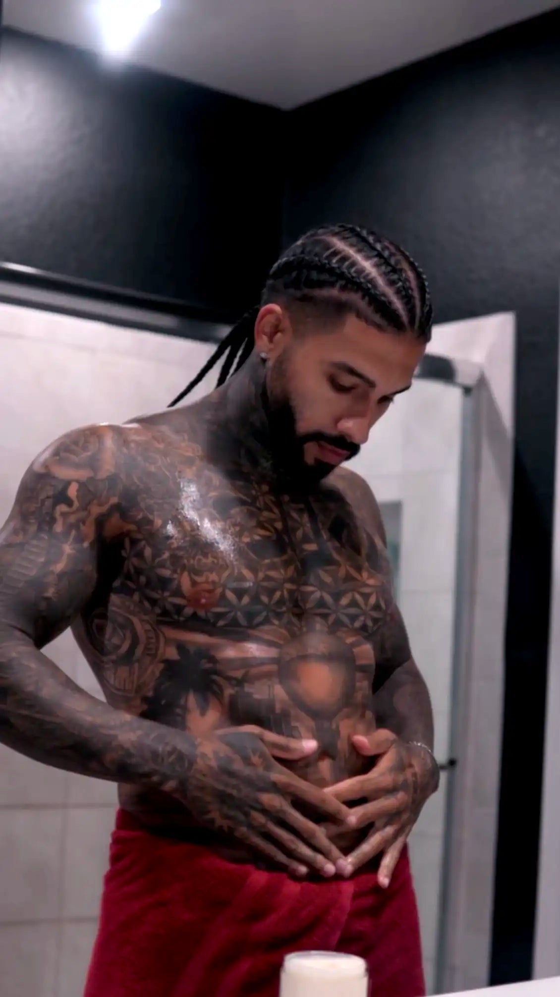 Lulu applying body butter after shower